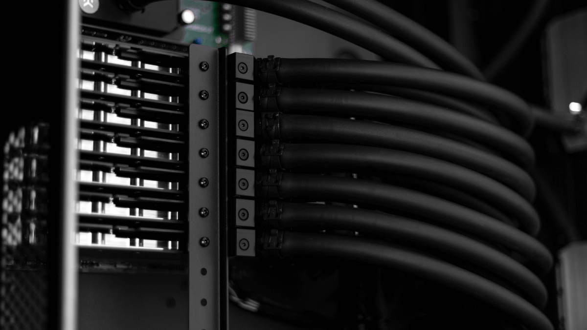 Seven water-cooled 3090 GPUs inside the EK Fluid Works Compute Series X7000 workstation